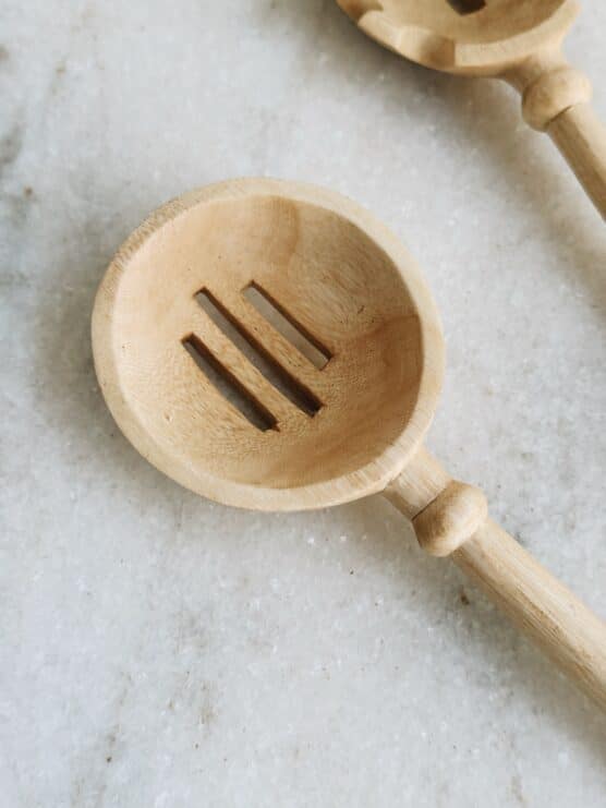 hand carved slotted wood spoon